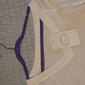 Camila top with crochet sleeve detail.  Cream/Off-White color. Size M